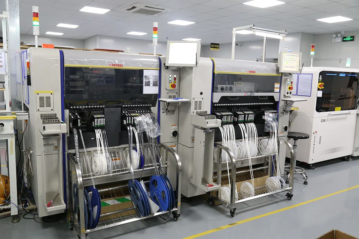 A photo of organized component kits being prepared for a consigned assembly line.
